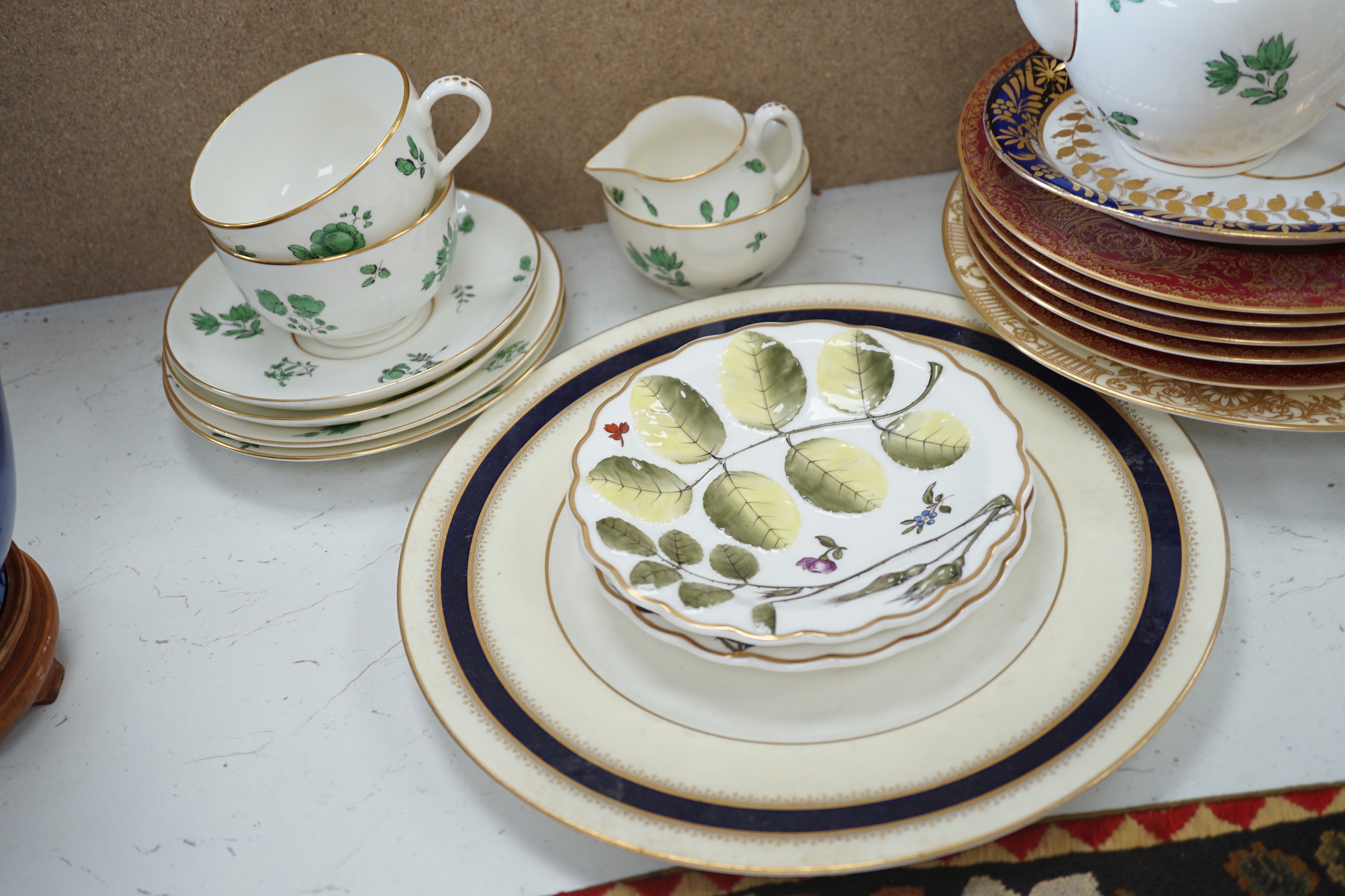 A Spode ‘tulip’ cup and saucer, a set of Sarreguemines month plates and collection of Worcester